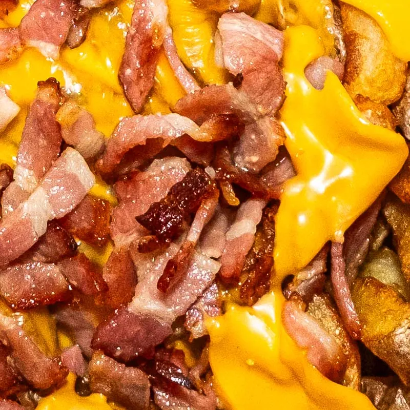 Frites loaded cheddar bacon Chez Magda